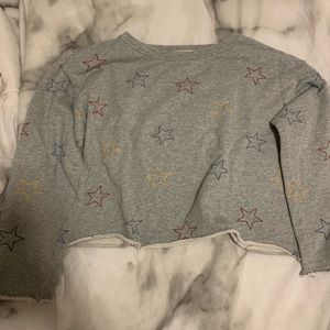 Gray top w/ red yellow & blue stitched stars